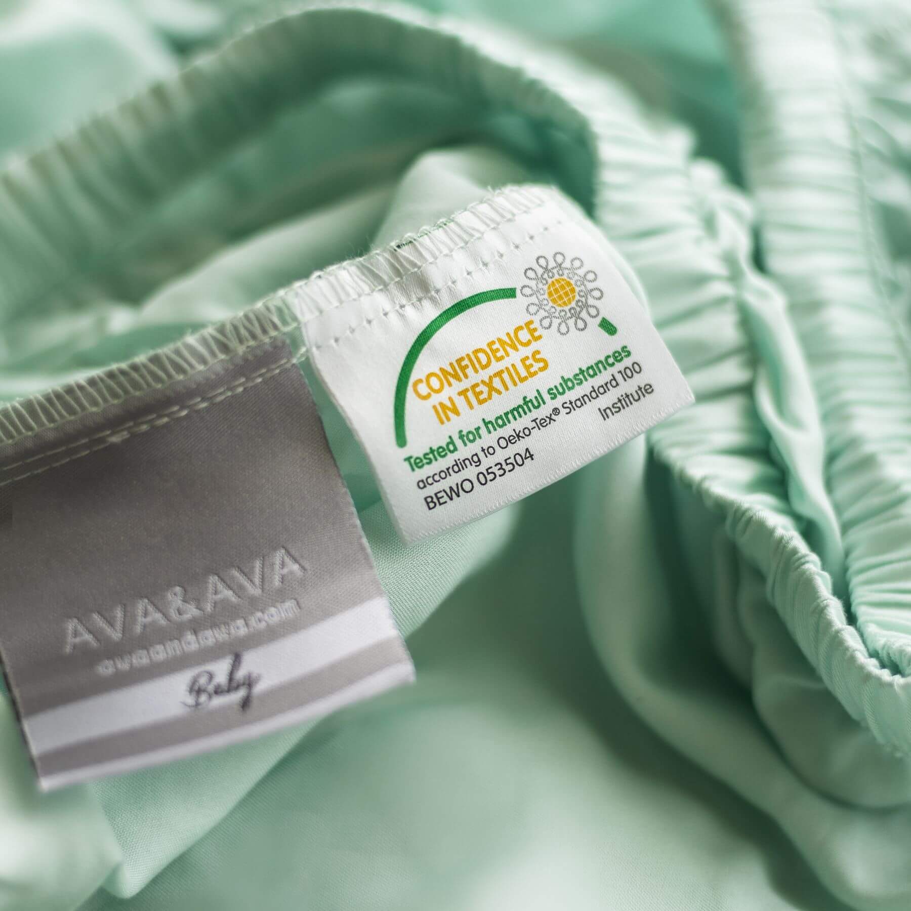 ava and ava ph bamboo lyocell baby bedding crib sheet closeup oeko-tex certified toxin free label