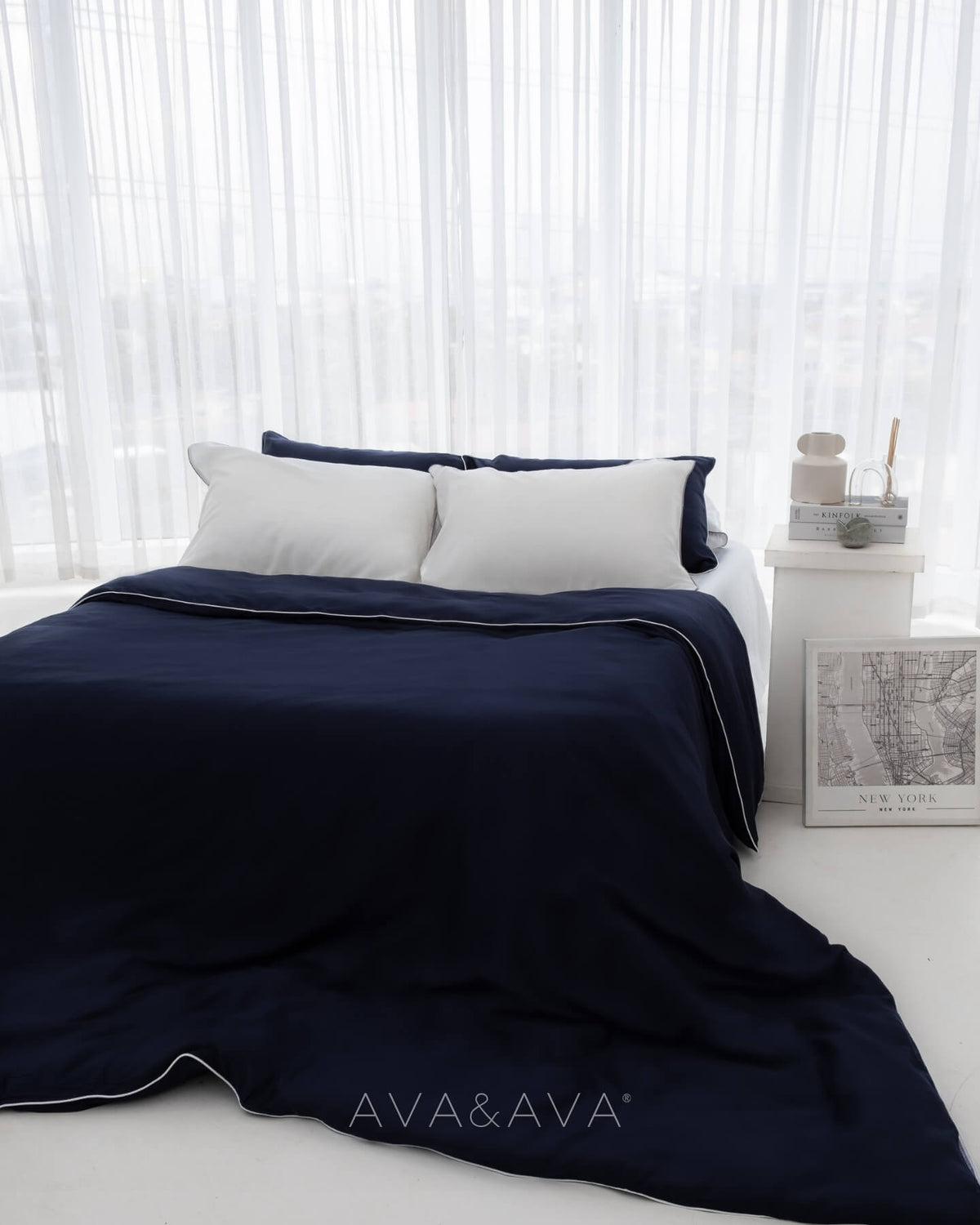 ava and ava ph organic bamboo lyocell duvet cover and sheet set (fitted sheet, pillowcases) in silver lining (OCEAN BLUE NAVY BLUE WITH WHITE piping). soft and cooling bedsheets perfect for summer. WHITE pillowacses