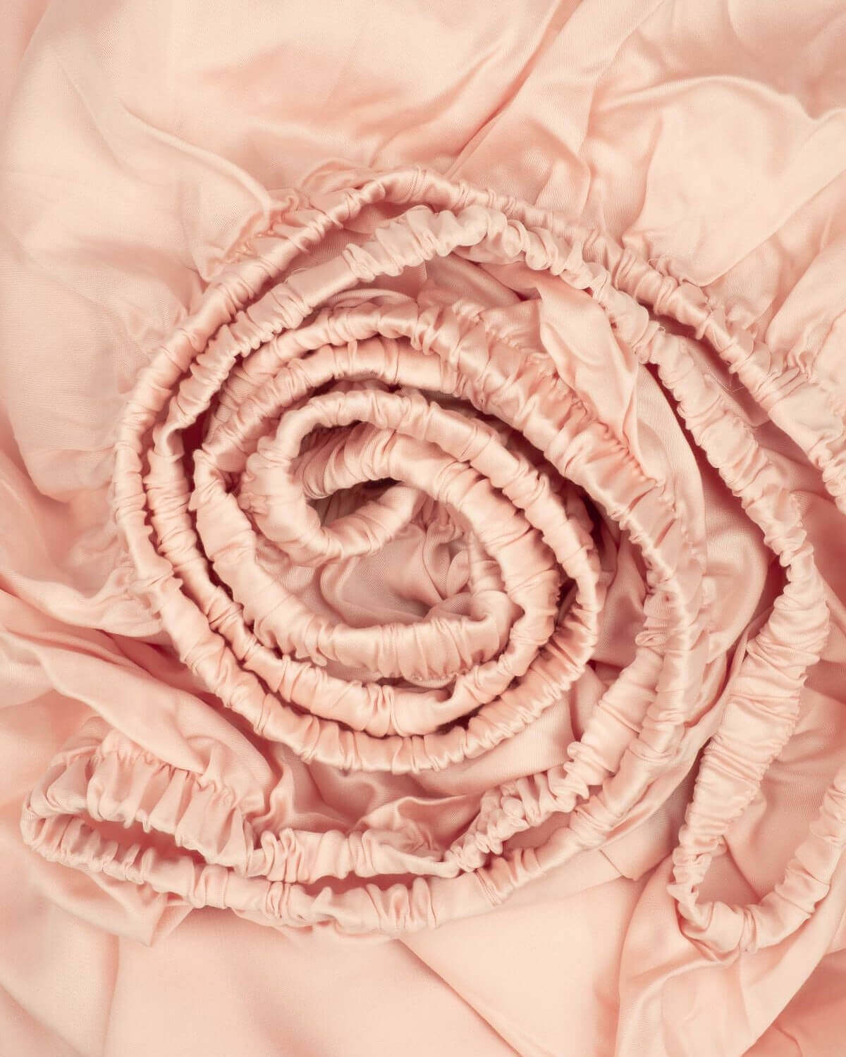 organic bamboo lyocell sheet set (2 pillowcases 1 fitted sheet) in daydream blush (pink with white piping). ava and ava ph soft, cooling, breathable bed sheets.