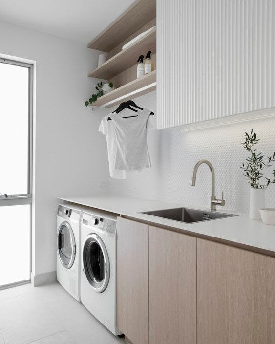 white and wood laundry room