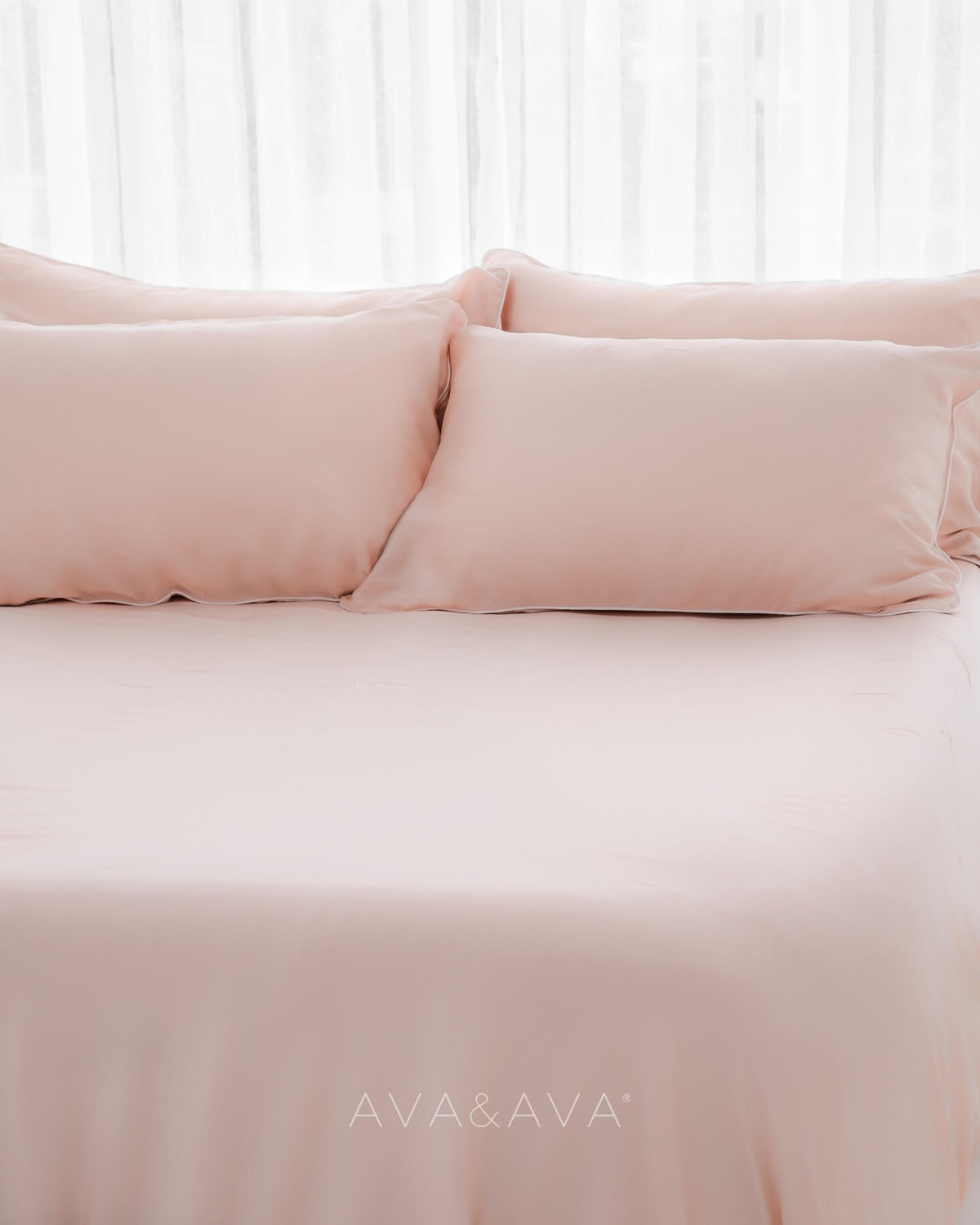 organic bamboo lyocell 3pc sheet set (2 pillowcases 1 fitted sheet) in daydream blush (pink with white piping). ava and ava ph soft, cooling, breathable bed sheets.
