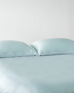 ava and ava philippines organic bamboo lyocell sheet set (2 pillowcases 1 fitted sheet) in powder blue (sky blue with white piping). ava and ava ph soft, cooling, breathable bed sheets.