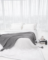 ava and ava ph organic bamboo lyocell duvet cover and sheet set (fitted sheet and pillowcases) in silver lining (white with gray piping). ava and ava ph soft and cooling bedding sheets.