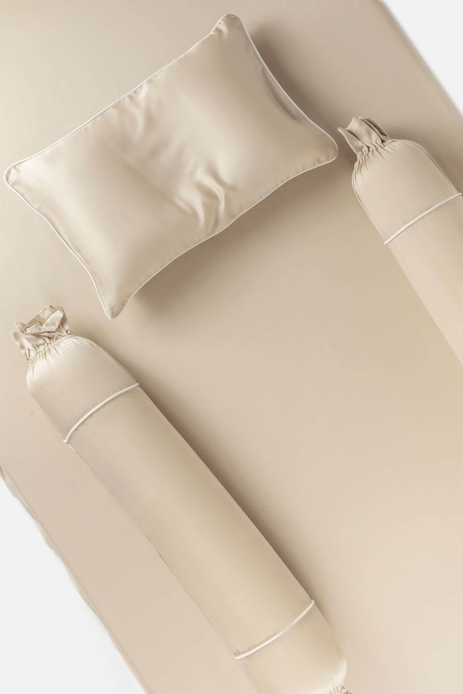 ava and ava ph organic bamboo lyocell baby fitted crib sheet and baby pillowcases in sandshell beige with white piping
