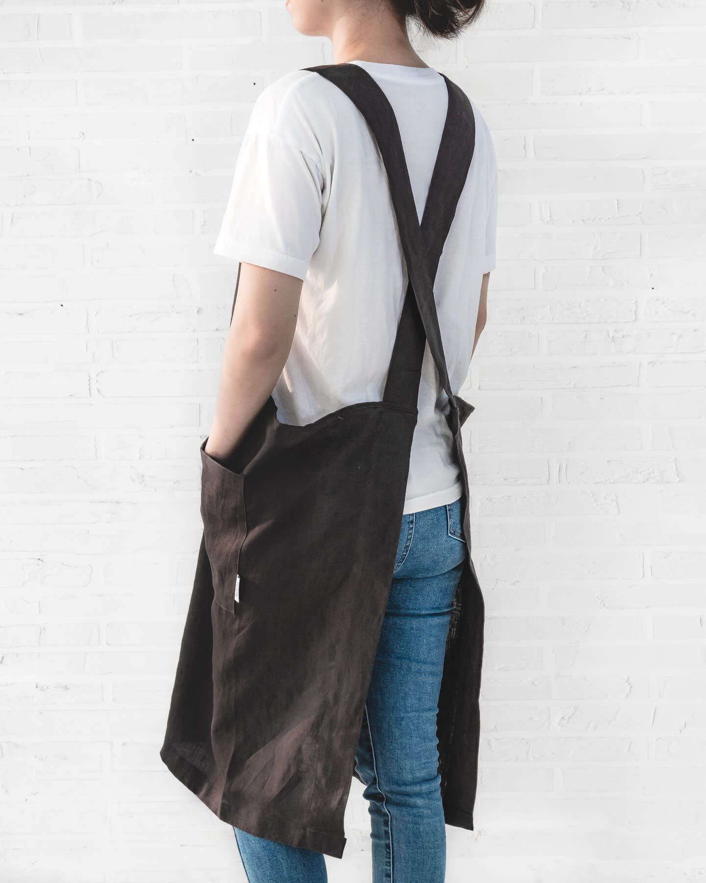 ava and ava ph Charcoal pure linen crossback apron on female adult, crossback straps, no ties